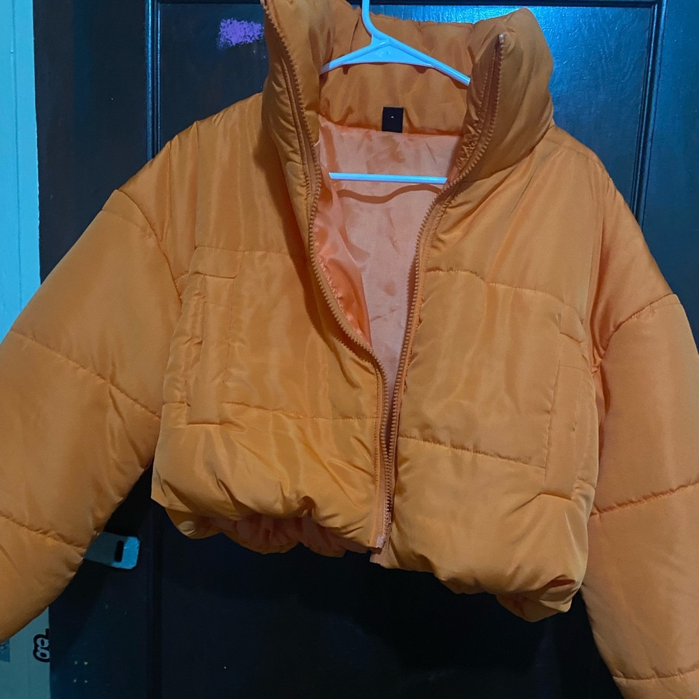 Orange puffer jacket